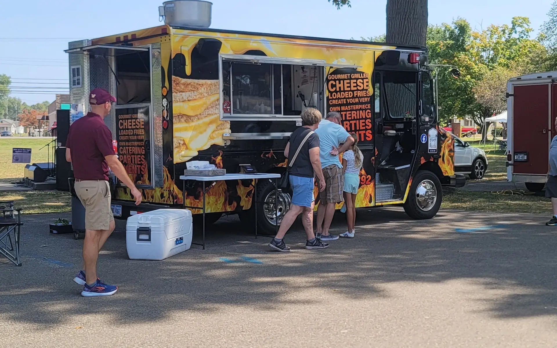 The Hangry House food truck serving customers